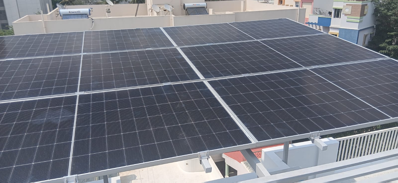 Rooftop solar panel array on a residential terrace
