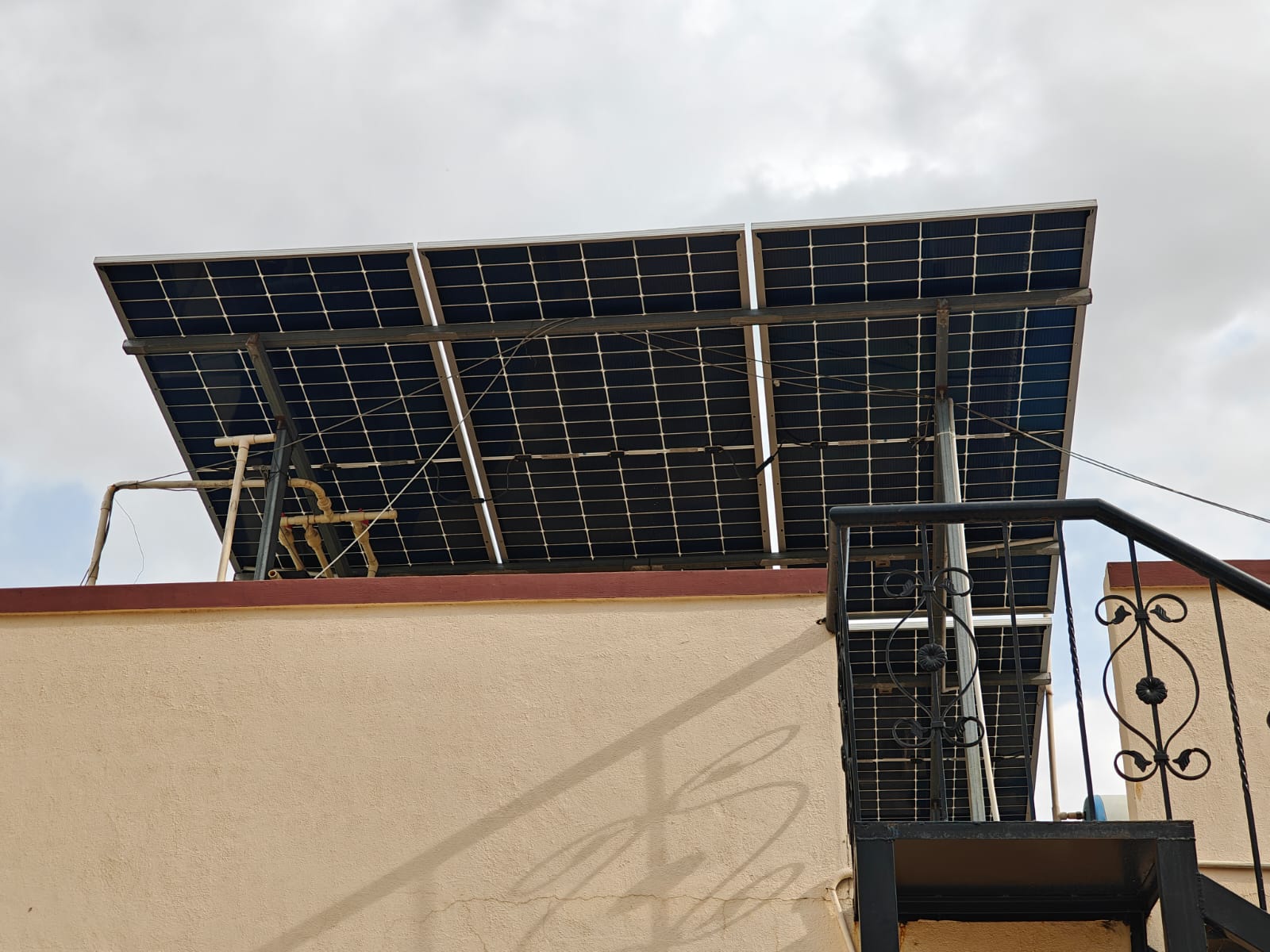 Rooftop solar panels above a residential building