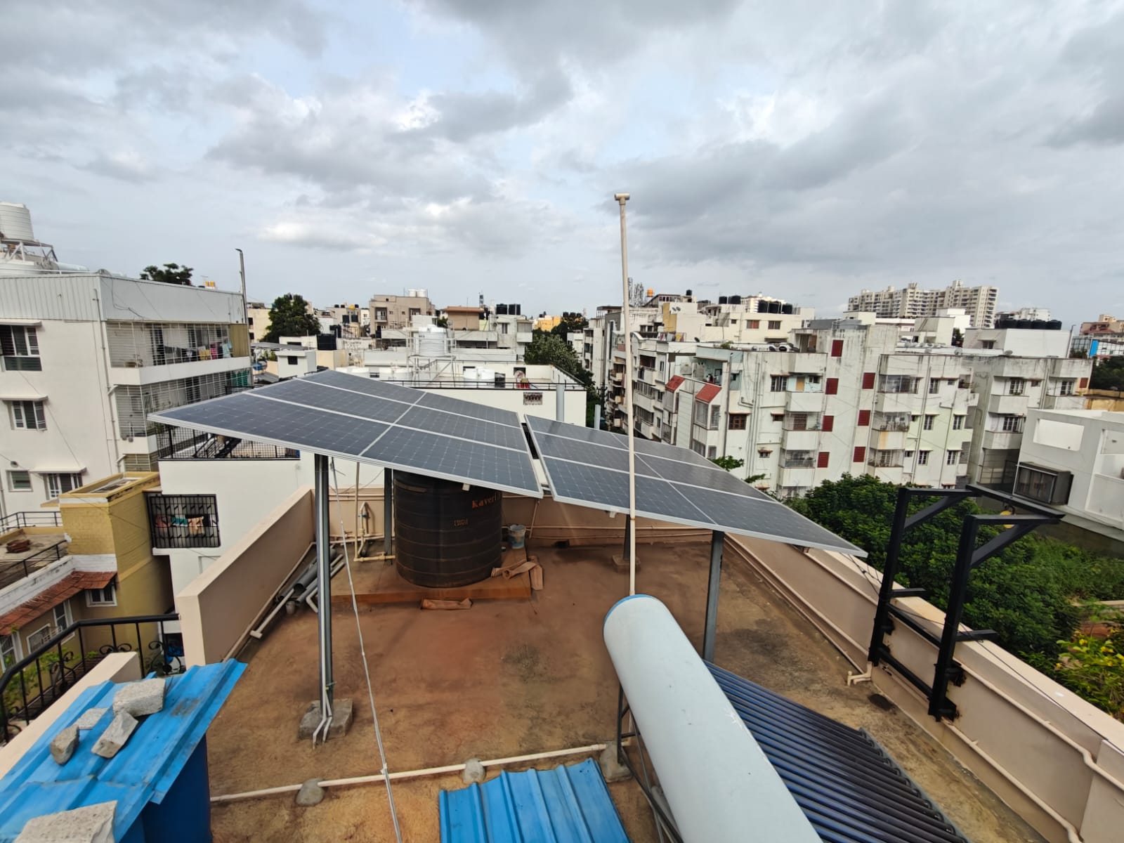 Solar panel installation on a city rooftop