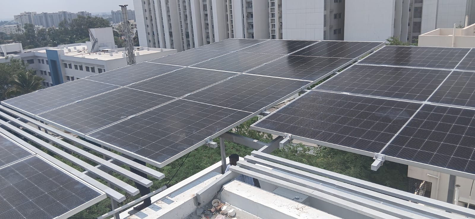 Elevated solar structure on an apartment rooftop